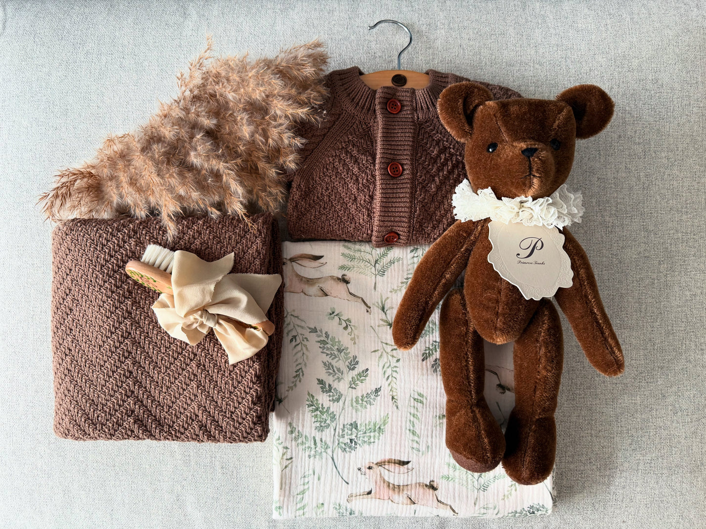 PRIMROSE TRUNKS PRIMROSE TRUNK BABY GIFT SET GREEN TRUNK ROMPER BLANKET BEAR BRUSH MUSLIN